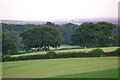 Rolling farmland with distant view of Southampton in SP5 2QY