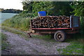 Trailer full of stakes at Upper Cowesfield Farm in SP5 1ES