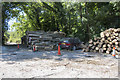 Ash dieback logs stacked in Eastbourne's Youth Hostel car park in BN20 8TD