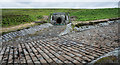 Stone-lined water channels at Hisehope Reservoir in Muggleswick