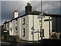 Old signpost in Mill Brow in WA10 5NG