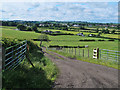Farm track and farmland south of Stonehouse in ML9 3EY