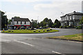 Roundabout with a stone cross in L37 4EW