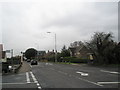 Looking west at the junction of Cot Lane and the A259 in PO18 8SJ