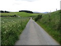 Minor road descending from New Morlich to the A97 in AB33 8SX
