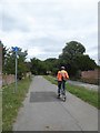 Cyclist pausing on the path on the B1209 in CO7 0QU