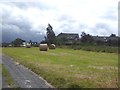 Bales beside the drive in NE47 0AB