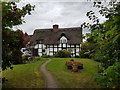 Timber framed thatched house near Court Farm in WR7 4NQ