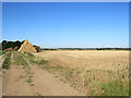 Bales, stubble and sky in SG8 7HZ