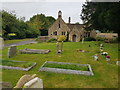 Old school house and churchyard, Latton, Wiltshire in Latton