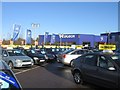Sunny car sales forecourt in RG24 9QN