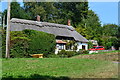 Thatched cottage by road junction, Swallowcliffe in SP3 5PJ