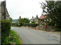 Pasture Field Lane entering the village of Ugglebarnby in YO22 5HU