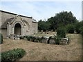 Grave slabs in St Mary's churchyard, Evedon in NG34 9PB