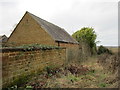 Ironstone wall and outbuilding, Culworth in OX17 2AR