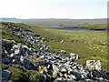 Rock outcrop north of Greencastle Tarn in CA9 3BU