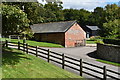 Buildings at Manor Farm, seen from the churchyard in SN8 4JW
