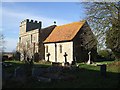 St. Michael's & All Angels in its churchyard in HP18 0TX