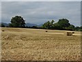 Straw bales in a stubble field in GL19 3PQ