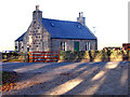 A cottage at a bend in the road, Anguston in AB14 0ND