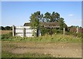 Derelict farm buildings by Banbury Lane in NN12 8PY