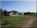 Farm buildings opposite Rambler's Castle in NP15 2EZ