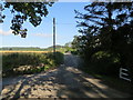 Junction of minor road and track at Netherton in FK9 5NT