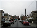Looking down Cosham Park Avenue towards Barclays Bank in PO6 3JL