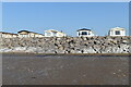Sea wall and holiday homes, Brean in TA8 2RR