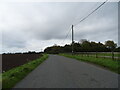 Minor road towards Wiggenhall St Mary Magdalen in PE34 3BB