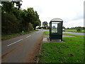 Bus stop and shelter on The Street, Sculthorpe in NR21 9NE