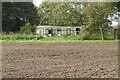Old railway carriage past its best in IP22 2JA