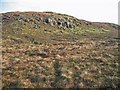 Crags above Loch Pooltiel in IV55 8WN