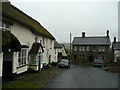 Thatched cottages and the Bell Inn, Chittlehampton in EX37 9QL