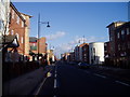 Stretford Road, Hulme, looking east to the Hulme Arch in M15 6GH