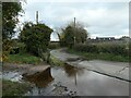 Flooding on a lane south-west of Withington in ST10 4PU