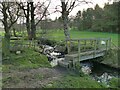 Footpath across a beck on Otley golf course in LS29 7FA