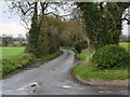 Minor country lane junction with North Walsham Road in NR28 9SS