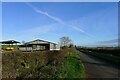 The road from Woodnewton passing Willow Bank Farm in PE8 5HY