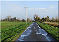 Puddles on Long Drove in CB25 9LW