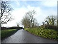Road junction and signpost near Burrow Farm in TA21 0LH