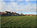 Grass field and housing, Long Bennington in NG23 5EP