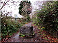Boulder across a footpath near Coychurch Crematorium in CF31 2BJ