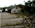 Building rubble and a derelict house near Llanddewi Rhydderch, Monmouthshire in NP7 9TW