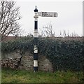 Signpost, foot of Spott Loan in EH42 1UU
