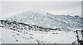 Snow covered slope north of Dun Coillich in PH16 5NL