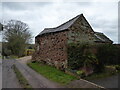Sandstone barn or shed beside the path in SY4 5XD