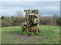 A stump that has figures and a view in BS30 7BA