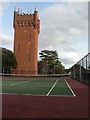 Seafield Gardens: tennis courts and water tower in BH6 3DX