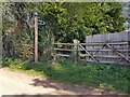 Footpath sign with stile, by Steadfield Cottage, Norchard in DY13 9SN